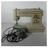 Kenmore sewing machine with foot pedal, powers up