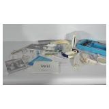 Wii console  with cords and operating manual plus