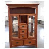 Craftsman style lighted cabinet, sides have glass