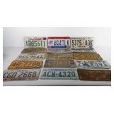 Fifteen license plates, includes South Dakota,
