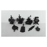 Cast metal wall plaques, includes butter churn,