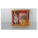 Poor pitiful Pearl doll with book and