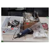 Hardware and Grinder. Brass Numbers, grinding