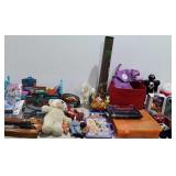 Group of toys, includes play mat, dolls, toy gun,