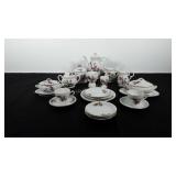 Tea set, includes teapot, creamer pitchers, sugar