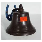 Wall mount bell with horseshoe bracket. Bell is