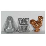 Metal molds. One chicken and 2 adult themed.