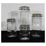 Clear canister set. Heights range from 6"-13".