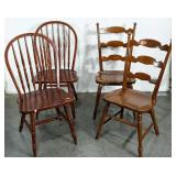 Four chairs, two different styles, some wear and