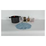 Mixed homegoods lot: cooking pot, blue doily,  2