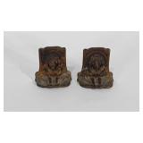 Cast Iron lion bookends.  Stand 3.75" tall.