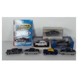 Eight state police cars, four in original