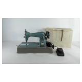 De Luxe Precision sewing machine with foot pedal
