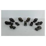 Group of toy military trucks and jeeps