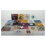Twenty-one 45 RPM records, includes Josie and Rhe