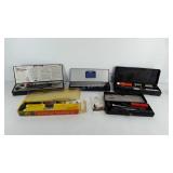 Group of gun cleaning kits, includes Outers,