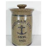 Stoneware canister with lid marked Michigan City