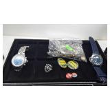 Two display cases with political buttons, dog