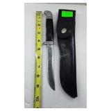 Buck knife with leather sheath