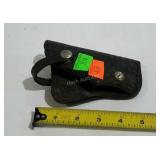 Leather holster,  basket weave pattern, marked