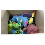 Box of dog toys, includes collar, squeaky toys