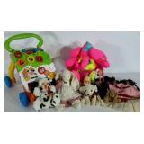 Group of toys and a Bumbo , seller code LW