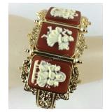 Cameo carved bangle bracelet 6.75in gold plated