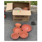 Box of plastic and clay flower pots, some under