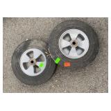 Two solid cart tires