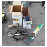 Parts. Mower blades, wrench, bulb planter, etc.