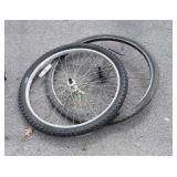 Two 26" mismatched Bike tires with wheels.