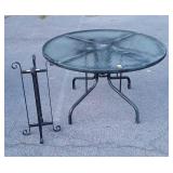 Two pc Outdoor Lot, 4ft glass top Table and metal