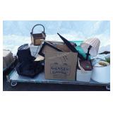 Skid with Coleman cooler, lamp and shades,