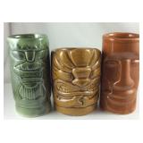 Three ceramic tropical Hawaiian tiki mugs