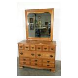 Four drawer maple dresser with mirror. Needs