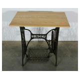 Singer pedal sewing machine base with newer top