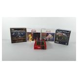 Five unopened puzzles, all are 500-1000 pieces