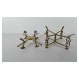 Two brass adjustable plant stands, one marked