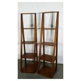 Two open bookcases with graduated shelves.