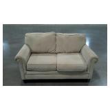 Loveseat in beige,  66" long. Seller code MK.