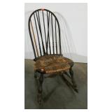 Older Windsor back, rush seat rocker. One spindle