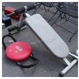 Two pc gym items, leg curl attachment, and Red DX