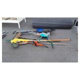 Tool lot, rakes, snow shovel, broom, string