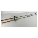 Two vintage fishing poles with Sears and