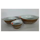 Three Pyrex bowls, Woodland Brown print, two