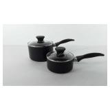 Cookware, two tools of the trade pots with lids,