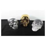 Three skulls, includes one glass skull and one