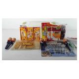 Sterilite storage tote full of office supplies,