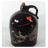 Stoneware whiskey jug with corn stopper, paint