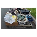 Skid with laundry basket filled with molding,